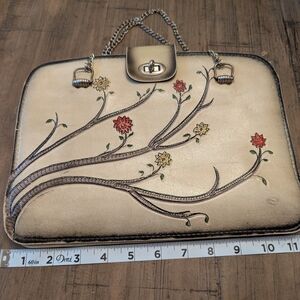 Vintage leather 3 pocket, flower stamped purse with chain hand straps